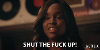 Woman Saying Shut The Fuck Up In Front Of Netflix Sign GIF