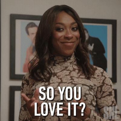 Woman Saying So You Love It In Front Of Framed Pictures GIF