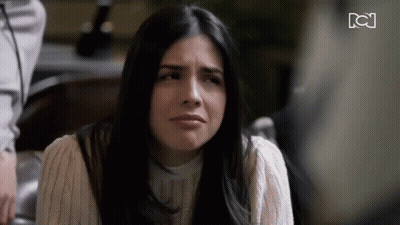 Woman Saying So You Love It In Front Of Framed Pictures GIF