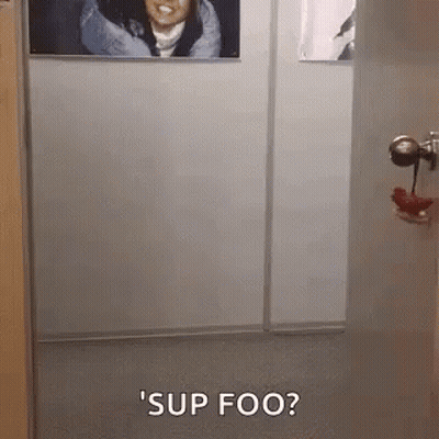 Woman Saying Sup Foo In Hallway GIF