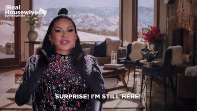 Woman Saying Surprise I'm Still Here GIF