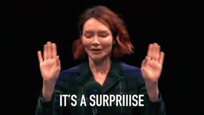 Woman Saying Surprise With Hands Up GIF