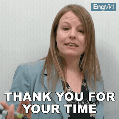 Woman Saying Thank You for Your Time in Front of EngVid Sign