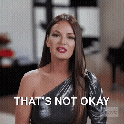Woman Saying That's Not Okay In Front Of Piano GIF