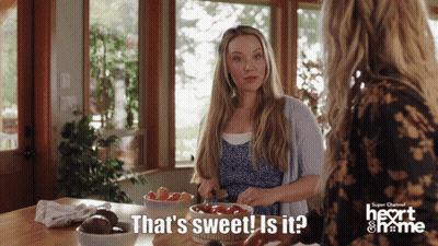 Woman Saying That's Sweet In Kitchen GIF