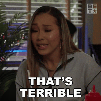 Woman Saying That's Terrible At Table GIF