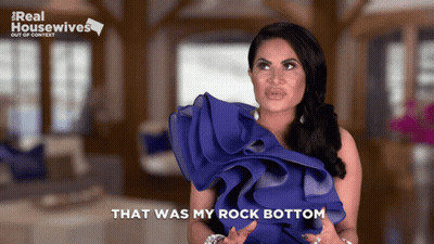 Woman Saying That Was My Rock Bottom In Blue Dress GIF