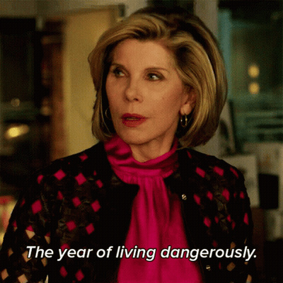 Woman Saying The Year Of Living Dangerously In Pink Shirt GIF