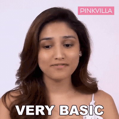 Woman Saying Very Basic In Pink Villa Ad GIF
