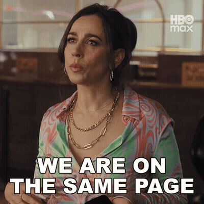 Woman Saying We Are On The Same Page In Colorful Shirt GIF