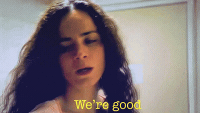 Woman Saying We're Good In Yellow GIF