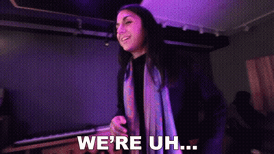 Woman Saying We're Uh In Front Of Piano GIF