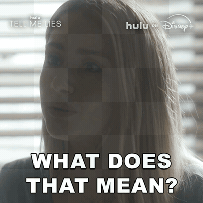 Woman Saying What Does That Mean In Front Of Disney Logo GIF