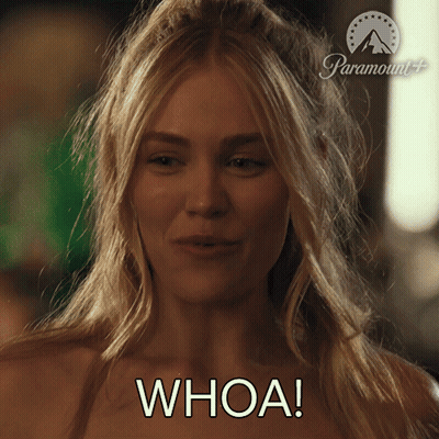 Woman Saying Whoa In Front Of Paramount Sign GIF