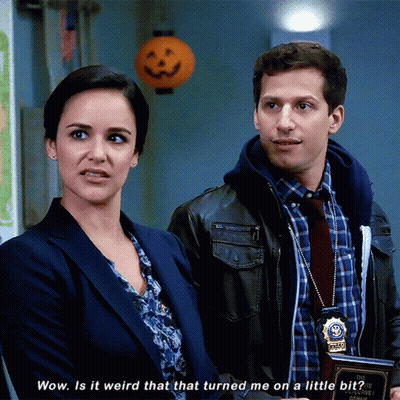 Woman Saying Wow Next To Man GIF