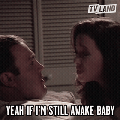 Woman Saying Yeah If I'm Still Awake Baby On Bed GIF