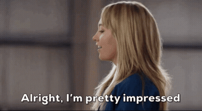 Woman Says Alright I'm Pretty Impressed Looking Down GIF