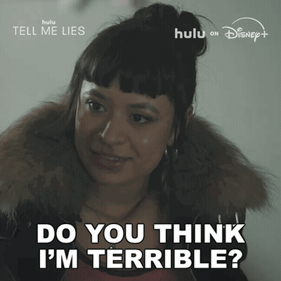 Woman Says Do You Think I'm Terrible In Front Of Tell Me Lies Sign GIF