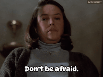 Woman Says Don't Be Afraid In Front Of Lamp GIF