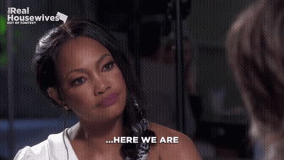 Woman Says Here We Are In Front Of Real Housewives Out Of Context Sign GIF