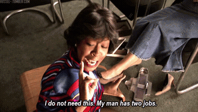 Woman Says I Do Not Need This My Man Has Two Jobs Sitting At Table GIF