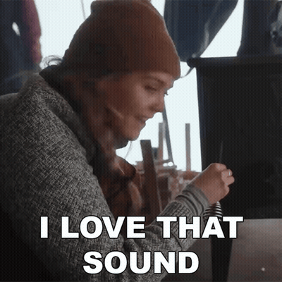 Woman Says I Love That Sound Holding Pen GIF