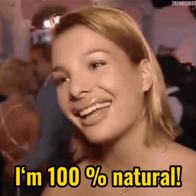Woman Says I'm 100% Natural And Smiles GIF