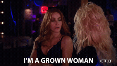 Woman Says I'm A Grown Woman In Front Of Neon Sign GIF