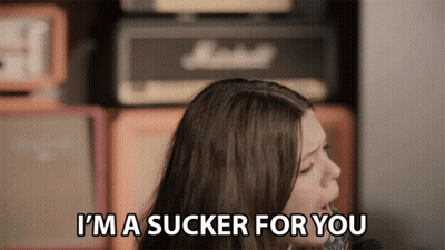 Woman Says I'm A Sucker For You In Front Of Marshall Amplifier GIF
