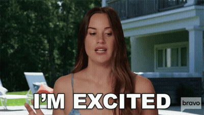 Woman Says I'm Excited In Front Of Large House GIF