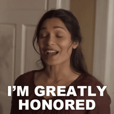 Woman Says I'm Greatly Honored In Front Of Door GIF