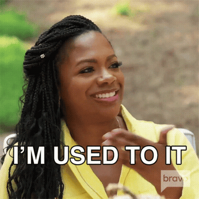 Woman Says I'm Used To It Yellow Shirt GIF