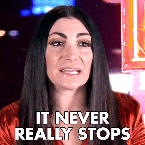 Woman Says It Never Really Stops Under Neon Lights GIF