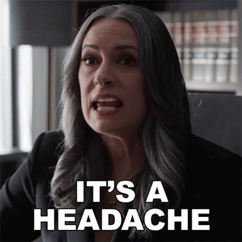 Woman Says It's A Headache In Front Of Bookcase GIF