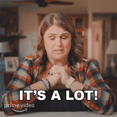 Woman Says It's A Lot In Front Of Picture Of Her GIF