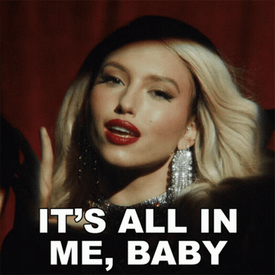 Woman Says It's All In Me Baby On Red Background GIF