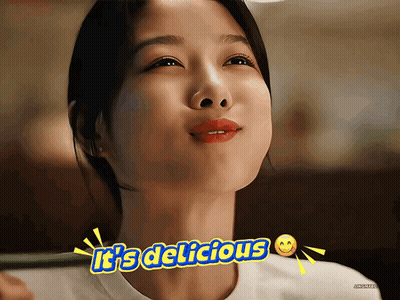 Woman Says It's Delicious With Smiley Face GIF