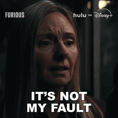Woman Says It's Not My Fault In Dark Room GIF