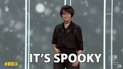 Woman Says It's Spooky In Front Of Screen GIF