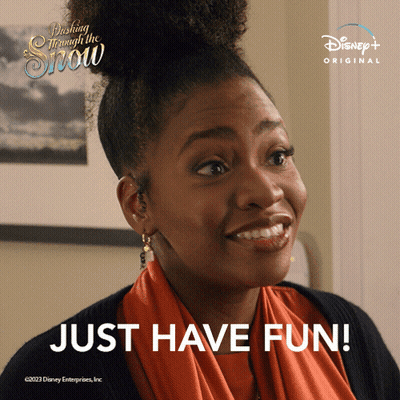 Woman Says Just Have Fun in Front of Disney+ Originals Poster