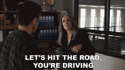 Woman Says Let's Hit The Road You're Driving GIF
