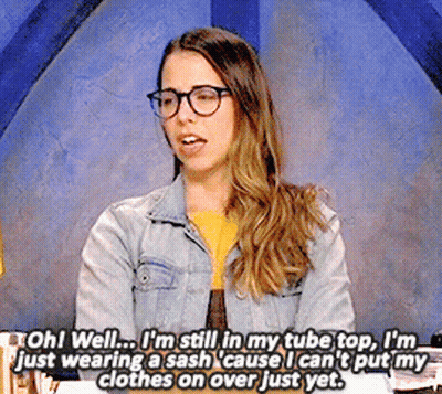 Woman Says Oh Well I'm In Tube Top GIF