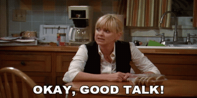 Woman Says Okay Good Talk Holding Cookies GIF