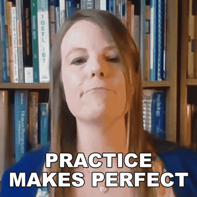 Woman Says Practice Makes Perfect In Front Of Bookshelves GIF