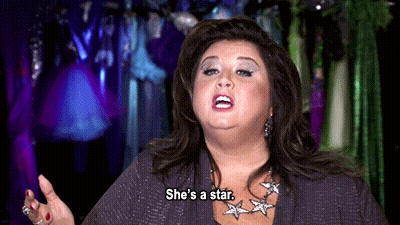 Woman Says She's A Star Wearing Necklace GIF