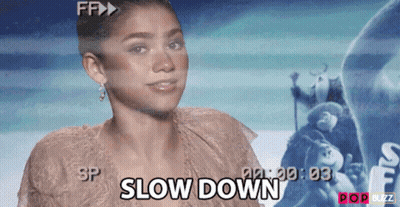 Woman Says Slow Down In Front Of Frozen Poster GIF