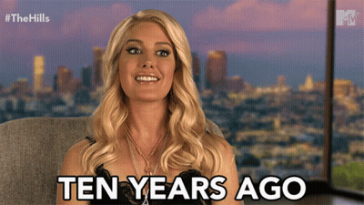 Woman Says Ten Years Ago In Front Of Cityscape GIF