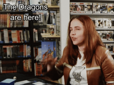 Woman Says The Dragons Are Here Bookshelf GIF