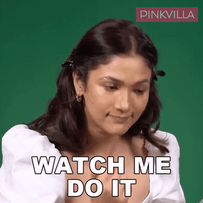Woman Says Watch Me Do It In Front Of Pinkvilla Logo GIF