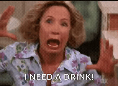 Woman Screaming Hands Up Saying I Need A Drink GIF